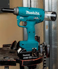 Heavy Duty Cordless Rivet Tool Featuring Brushless Motor And 10KN Pulling Force Cracks Steel Aluminum Rivets Up To 3 16 Inches on portable workbench.
