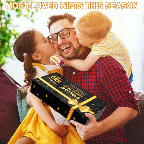 Smiling dad holding Ultimate 26 Piece Stainless Steel BBQ Grill Tools Set With Storage Bag gift, hugged by two kids
