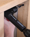 Right Angle Drill Attachment With 3 Eighth Inch Chuck And 6 Sided Hex Shank in use for tight spots, showing dual handles.