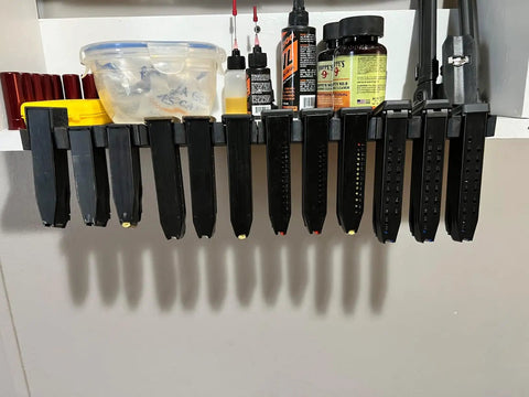Lock Down Your Gear With This Heavy Duty Magazine Rack Precision Fit For Glock 17 19 26 31 32 33 34 Mags displaying multiple magazine clips mounted securely.