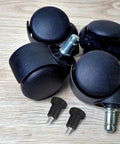 Top Shelf Office Chair Replacement Casters 10 Pack Of Tough As Nails Nylon And Alloy Steel Wheel Glides close up on black glides