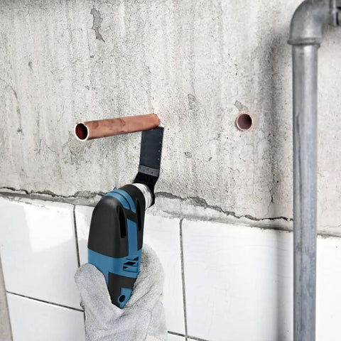 12V Max EC Brushless Starlock Oscillating Multi Tool Bare Tool with 3-D Starlock Interface cutting copper pipe in wall