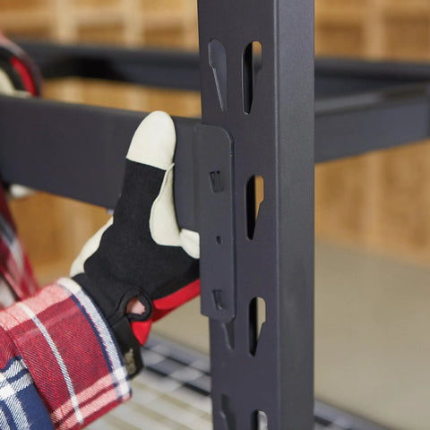 Person wearing gloves adjusting the height of the frame on High Octane Heavy Duty Industrial Storage Shelving Racks.