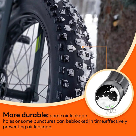 Close-up of bike wheel with Two Pack Self Sealing Fat Bike Inner Tubes For 20 By 3.0 And 3.5 Tires With 32mm Schrader Valve Puncture Resistant