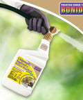 Outdoor Chipmunk Squirrel and Rodent Repellent Spray 32 Oz Ready to Spray Formula to Protect Your Lawn and Garden Natural Essential Oil Based Deterrent for Yard Critter Control, with gloved hand spraying.