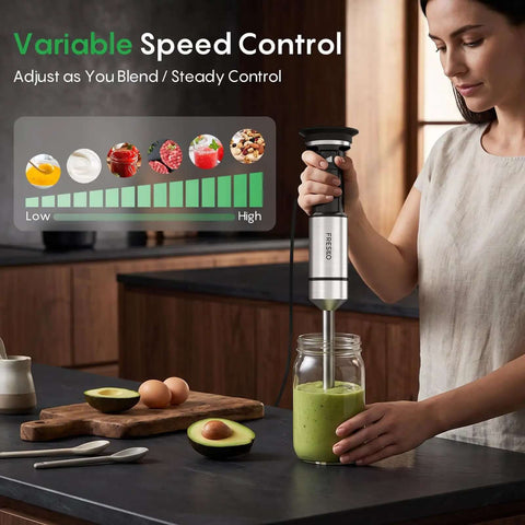 Powerful Immersion Hand Blender With Trigger Variable Speed For Precise Blending in use blending smoothie in a jar.