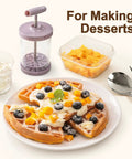 Handheld Manual Whipping Cream Dispenser No Battery Needed For Quick Whipped Cream In 60 Seconds Non Slip Silicone Base Professional Cream Maker For Desserts Coffee Milk Froth Purple next to waffles with cream and fruit