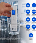 Straight Up Reliable Water Quality Tester Pen checks COD TOC UV275 EC TDS Salinity GH SG and water temp in a glass of water.