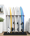 Heavy Duty One Piece Surfboard Wall Rack With Powder Coated Carbon Steel Build Anti Slip Rubber Cradle And Tough Bungee Straps For Secure Garage Organization Holds Up To Six Boards Dope Gear displaying six surfboards organized against a wall.