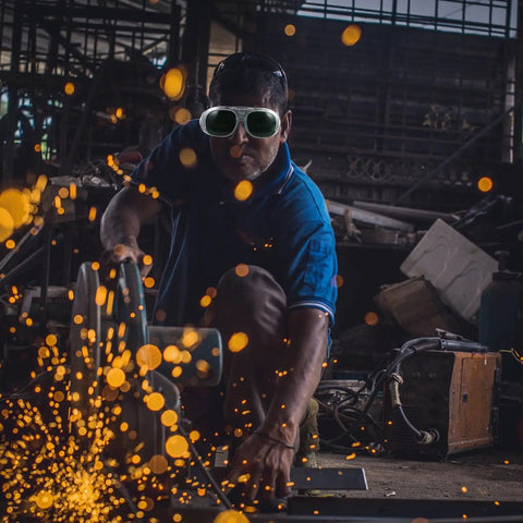 Welders using Two Piece Electric Welding Glasses And Tough As Nails Safety Goggles featuring a scratch resistant coating.