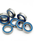 10 Pack 12X21X5MM 6801RS Ball Bearings ABEC Seven Precision steel with blue seal, shown in a scattered arrangement.