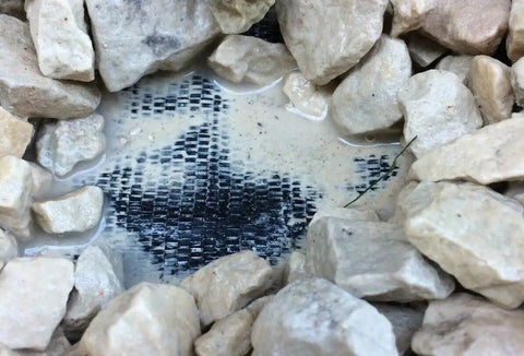 Heavy Duty Weed Barrier Landscape Fabric 6Ft Wide By 50Ft Long, 3.2oz Polypropylene Woven Geotextile Ground Cover visible under gravel