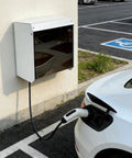 Universal EV Charger Cover With Wall Mount Hardshell Enclosure And Sloping Waterproof Canopy installed on wall, protecting charger.