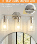 Three Light Bathroom Vanity Light Fixture In Brushed Nickel With Clear Glass Shades Over Mirror Wall Sconce No Fuss Easy To Install