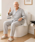 Heavy Duty Carbon Steel Toilet Safety Rails With Rock Solid Grab Bars For Seniors Bathroom Standing Assist Support Frame And Solid Armrest Setup That Handles Two Sixty Pounds Without Breaking A Sweat, elderly man giving thumbs up on toilet.