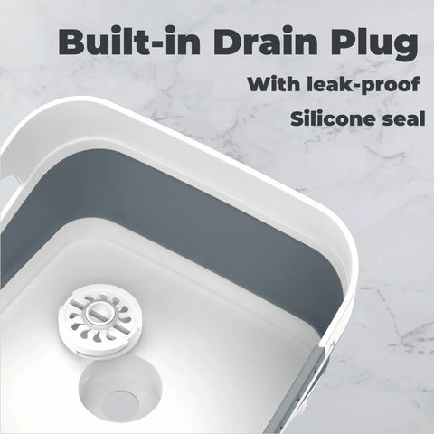 Close-up of drain plug in 2.6 Gallon Collapsible Wash Basin With Drain Plug For Baby Bottles And Dishes, gray color