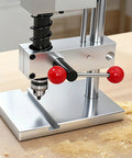 This Mini Bench Drill Press Features A Sturdy Rectangular Base And Smooth Adjustment Knobs For Precise Drilling on a tabletop.