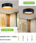 Modern Black And Gold Flush Mount Ceiling Light With Glass Drum Shade in on and off mode