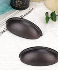 12 Pack Oil Rubbed Bronze Cabinet Pulls Featuring 3 Inch Hole Centers And Hella Sturdy Zinc Alloy Build For Kitchen Drawer Cup Handles With A Smooth Finish That Makes Installation Total No Sweat - close-up view