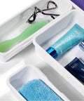 Close-up of 8 Piece Interlocking Bin Pack Drawer Organizer For Office, Kitchen, Tools And Bathroom Junk Drawer Essentials, Modular Storage System.