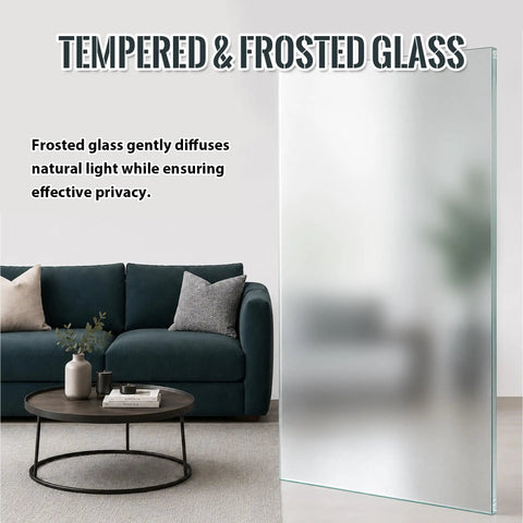 Upgrade Your Living Space With These Kickback Style Bifold Barn Doors Featuring Smooth Gliding Frosted Glass Panels 28X84 Inches showing tempered frosted glass in a modern living room.