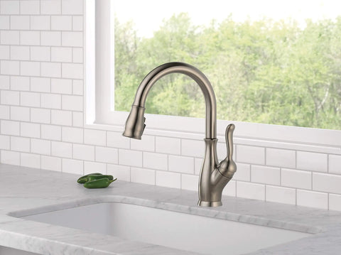 Leland Single-Handle Pull-Down Kitchen Faucet With ShieldSpray, Refurbished Stainless Finish installed on modern countertop