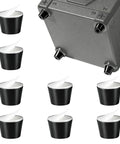 Hella Grippy Rubber Speaker Isolation Feet Self Adhesive Anti Vibration Damping Silicone Bumpers For Guitar Amps Studio Monitors And Audio Gear Eight Pack with black rubber feet and a studio monitor.