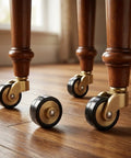 Solid Brass Furniture Casters, Hella Heavy Duty Smooth Rolling Wheels With Threaded Stems on wooden furniture legs.