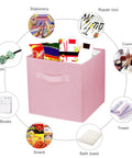 Super Durable Collapsible Storage Cubes 10 5 Inch Foldable Fabric Bins showcasing stationery and snacks inside a pink bin.