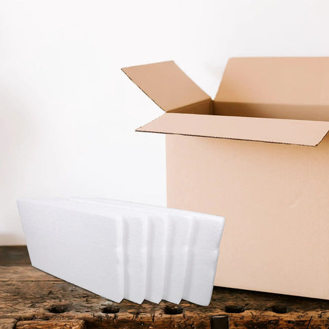 Heavy Duty White Foam Board Panels For Tight Parcel Wrapping And Rock Solid Packing Supplies lying next to an open box.