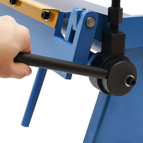 Close-up of hand adjusting 24 Inch Pan And Box Metal Brake With Removable Fingers For Sheet Metal Bending and Fabrication