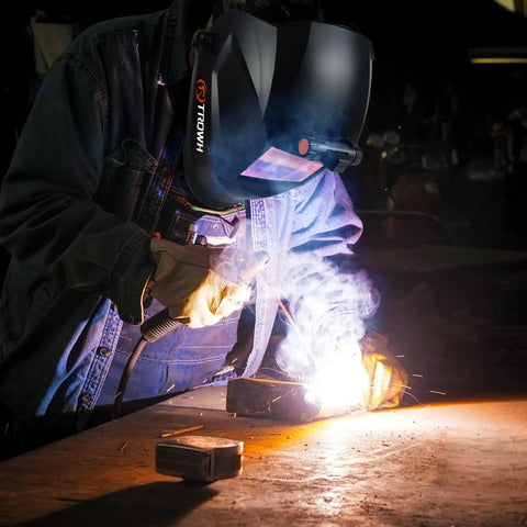 Welders using 2 Pack Welding Helmet Magnifying Cheater Lenses 3.0 Diopter for improved visibility while welding.