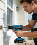 Heavy Duty Cordless Drill Set With 21V Rechargeable Battery And Brushless Motor Delivers Serious Punch For Concrete And Metal With Two Speed Settings Making It A Built Like A Tank Power Tool For Real Projects Or Weekend Hustle Zero Hassle Guaranteed, being used to drill into a wall.