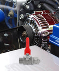 Heavy Duty Copper Quick Snap Ball Valve Two Pack With Rock Solid Handle Quarter Inch Male Thread installed in an engine bay.
