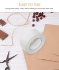 Hella Strong Double Sided Adhesive Tape 5Cm X 164 Feet Pet Roll, on a desk with scissors and craft materials for home projects.