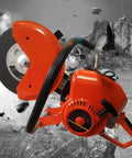 Professional Grade Hardcore Cordless Gas Concrete Saw Cuts Like Crazy For All Day Demolition Grinds And Crushes Steel Marble And Brick Without Breaking A Sweat On The Job Site, showing robust orange saw with blade.