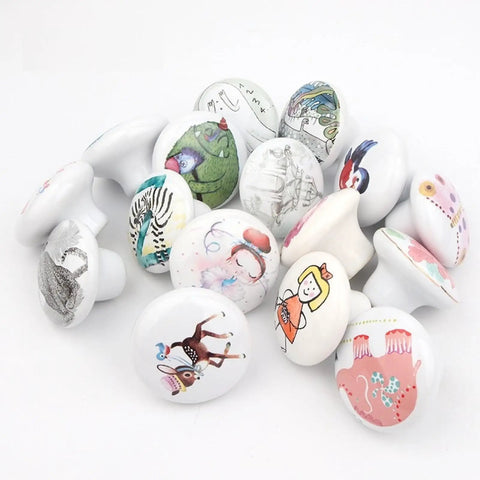 Dang Cute Cartoon Ceramic Drawer Knobs With Sturdy Zinc Alloy Core Comfortable Grip Kitchen Cabinet Pulls And Wardrobe Hardware Four Pack on white background.