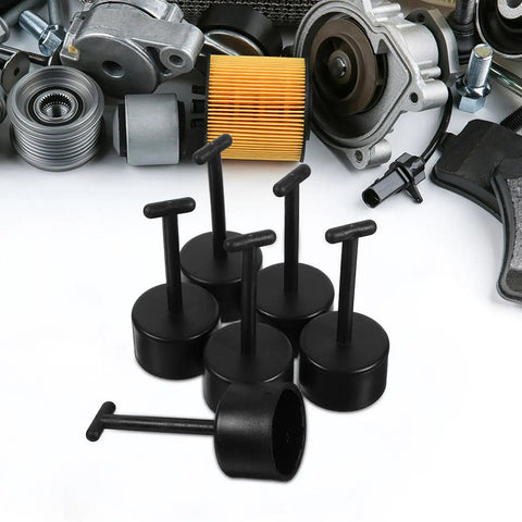 Six Piece T Shaped Plastic Wrench Set For Quick Lamp Holder Socket Ring Removal And Hassle Free Light Fixture Assembly That Really Nails The Job Every Time on a workbench.