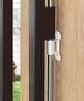 Close-up view of Top Shelf White Fence To Wall Anchor Kit For Tight Dog Playpen Sets compatible bracket mounted on wooden post.