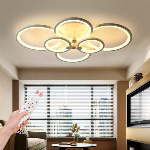 Person using remote on Six Ring LED Ceiling Light With Remote Control Dimmable White Flush Mount Fixture For Living Room Bedroom Dining Room Kids Room Sleek Modern Aluminum 55W Energy Saving Ceiling Lamp