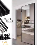 Trackless Concealed Sliding Door Hardware Kit For 36 To 60 Inch Openings Black Mirrored Finish installed in modern living room