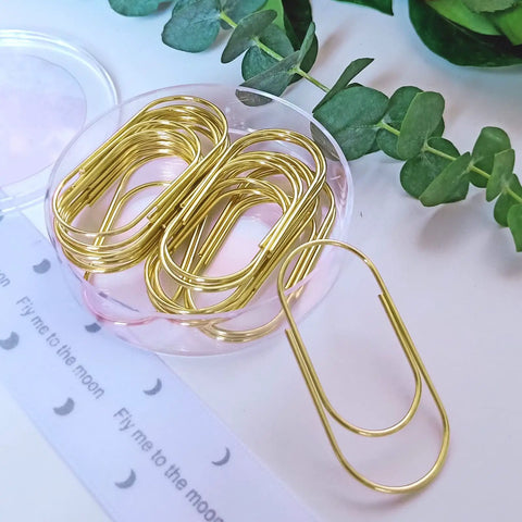 Oversized Gold Paper Clips Set, Big Ol Jumbo 2 Inch 50mm Clips, 20 Pack displayed in round container on white surface
