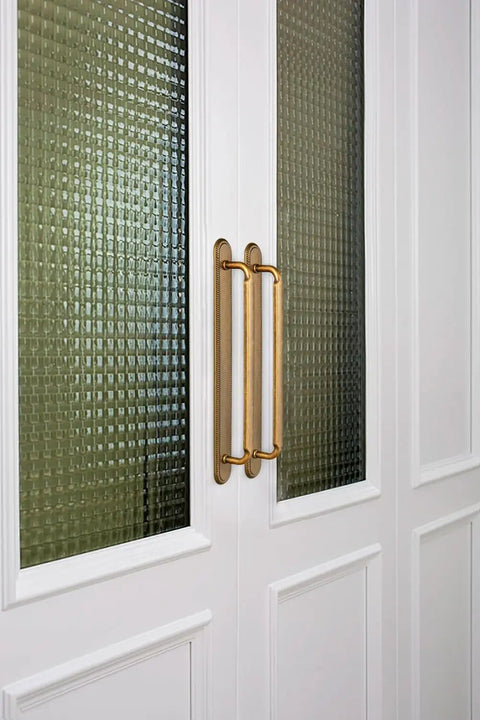 Game Changing Antique Brass Cabinet Pulls and Drawer Handles, 5 Inch Hole Center zinc alloy handles on glass door.