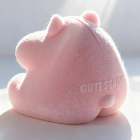 Totally Sweet Handmade Squishy Hamster Toy For Chill Out Vibes, ultra soft pink silicone fidget toy side view.