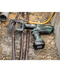 Heavy Duty Gator Remote Cable Cutter Bare Tool With Wireless Remote for snipping soft metal jackets resting on ground near cables.