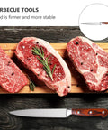 Stainless Steel Barbecue Tool Set With Grilling Fork And Cutter Wood Handle Outdoor BBQ Utensils shown with raw steaks on board