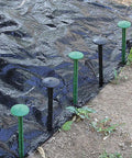 50 Pack Landscape Fabric Stakes Black Plastic Anchoring Spikes 6.3 Inch securing weed barrier on garden soil