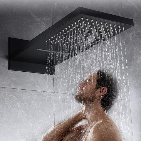 Wall Mounted Concealed Shower System With All Copper Thermostatic Valve Slick Matte Black Finish In Wall Waterfall Rain Shower Set, user enjoying smooth water flow.
