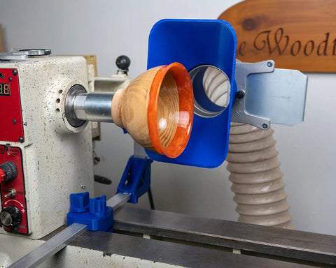 Kickass Adjustable Dust Collection Rig For Split Bed Wood Lathes With Tight Four Inch Hose Hookup and Three Way Flex Brackets in use on lathe.