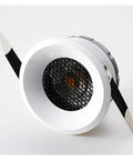 Close-up of a 7W/9W/12W/15W COB LED Downlights Dimmable Recessed Ceiling Lights with white trim and honeycomb pattern.
